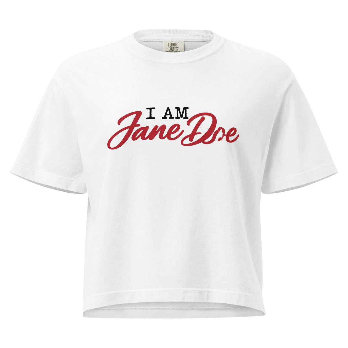 A white short-sleeve crop top t-shirt featuring the text 'I AM Jane Doe' printed on the chest, with 'I AM' in black block letters and 'Jane Doe' in a red cursive script, shown against a plain white background.