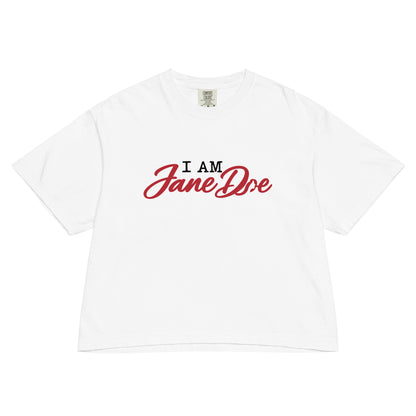 A white short-sleeve crewneck t-shirt with a graphic on the chest reading 'I AM Jane Doe' in black and red script, displayed flat against a white background.